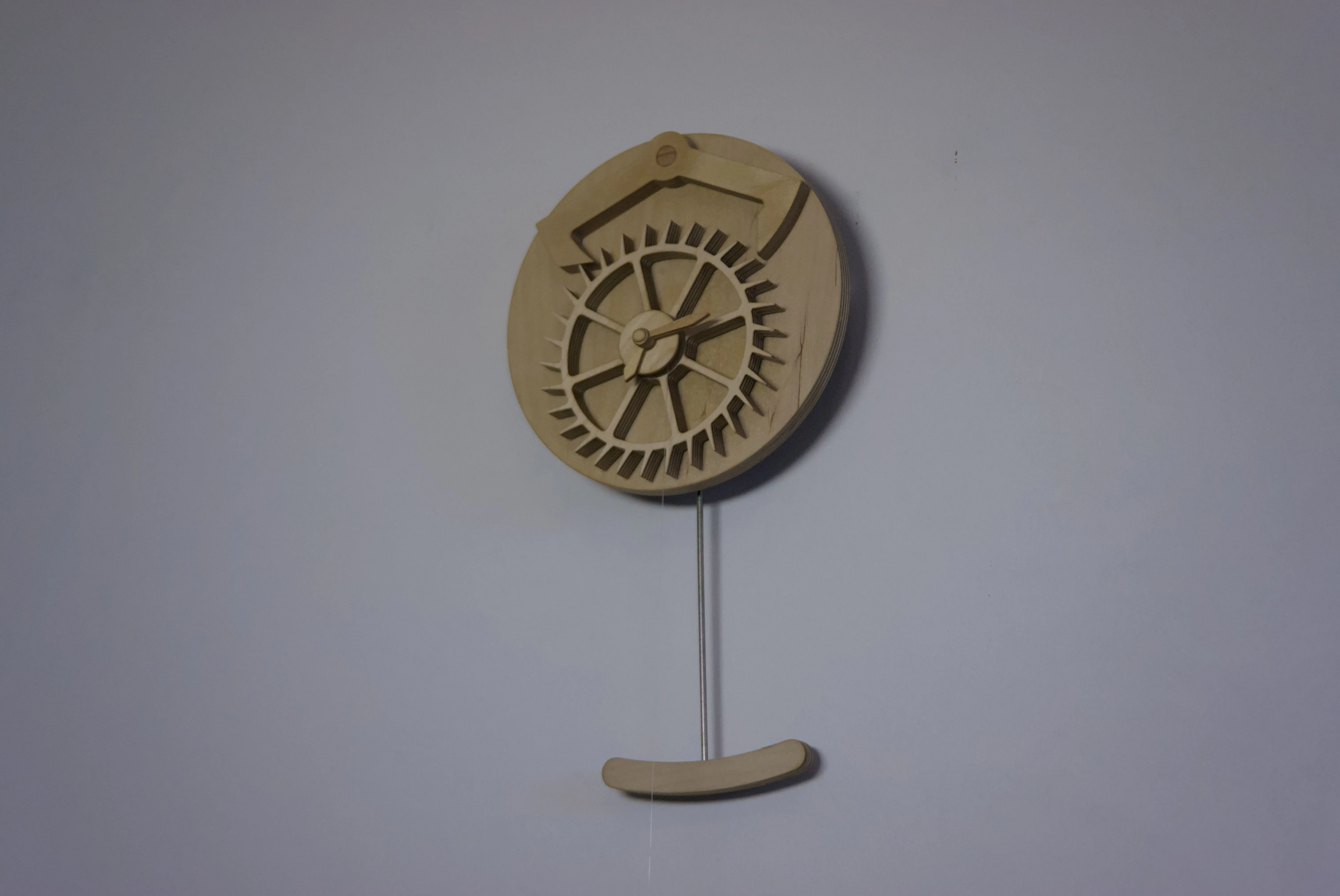 View of a clock with a decorative escapement